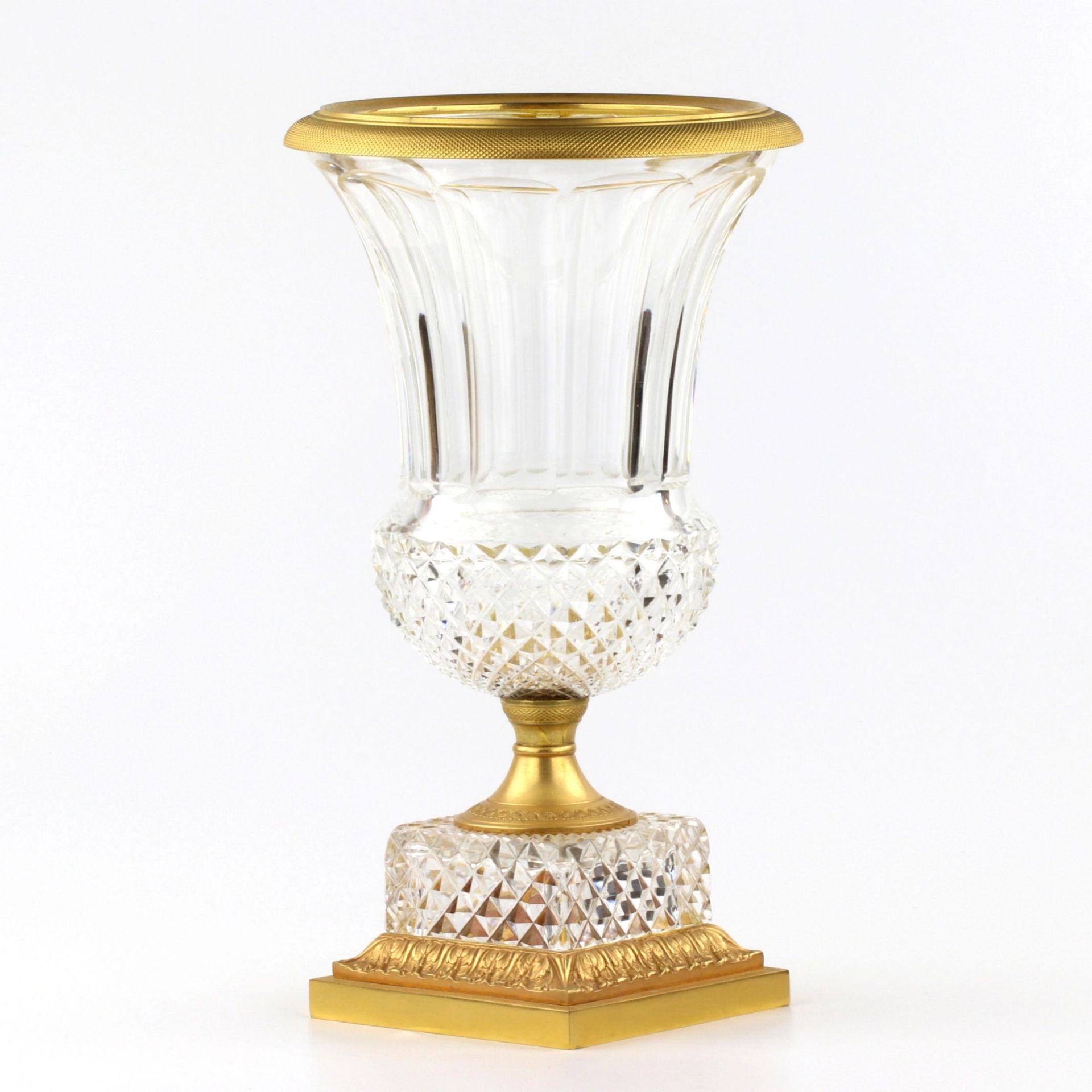 Crystal vase with gilded bronze.