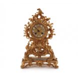 Mantel clock in Rococo style.