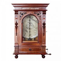 A large vertical symphony of walnut wood. End of the 19th century.