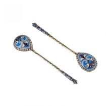 A pair of Russian silver spoons with enamel and gilding. The turn of the 19th-20th centuries.