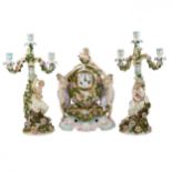 Porcelain clock set with candelabra. Sitzendorf. 1880