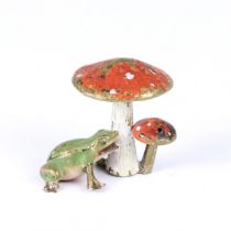 Frog under a fly agaric. Vienna bronze