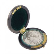 Napoleon III era memorial silver medal in a Boulle style case. France. 19th century.