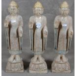 Drei stehende Buddhas. Asien. Stein, gehauen, H=je 44 cm. **