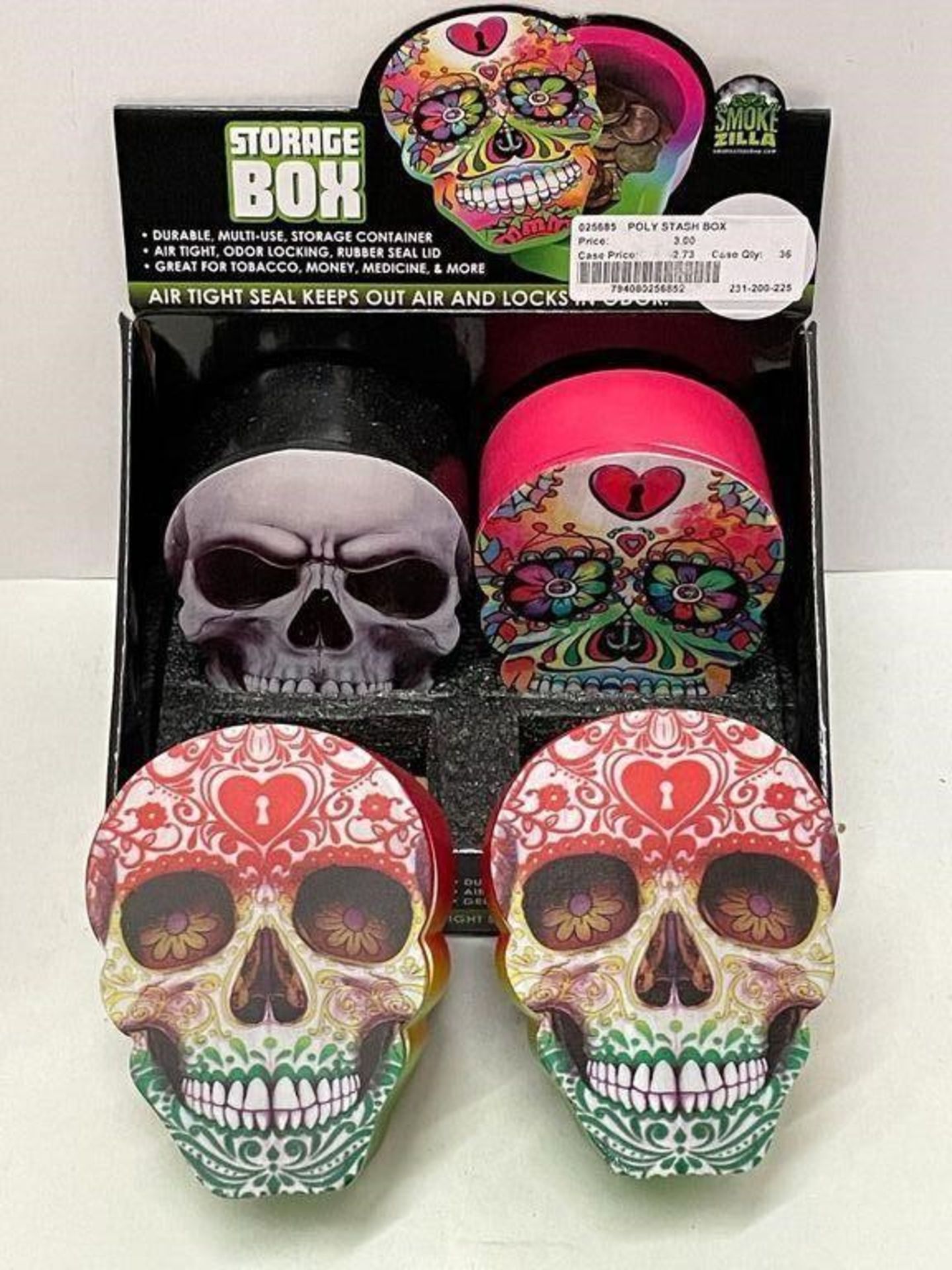 4 X SKULL STORAGE BOXES, AIR TIGHT SEAL, VARIOUS DESIGNS, IN DISPLAY CASE