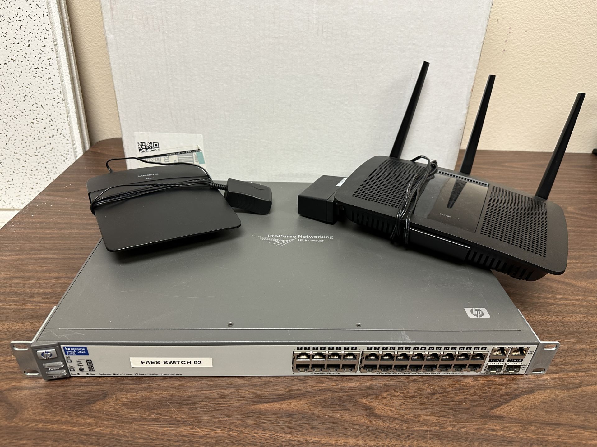 Networking Equipment: HO Procurve Switch, Linksys E1200 and Linksys EA7300, FA3