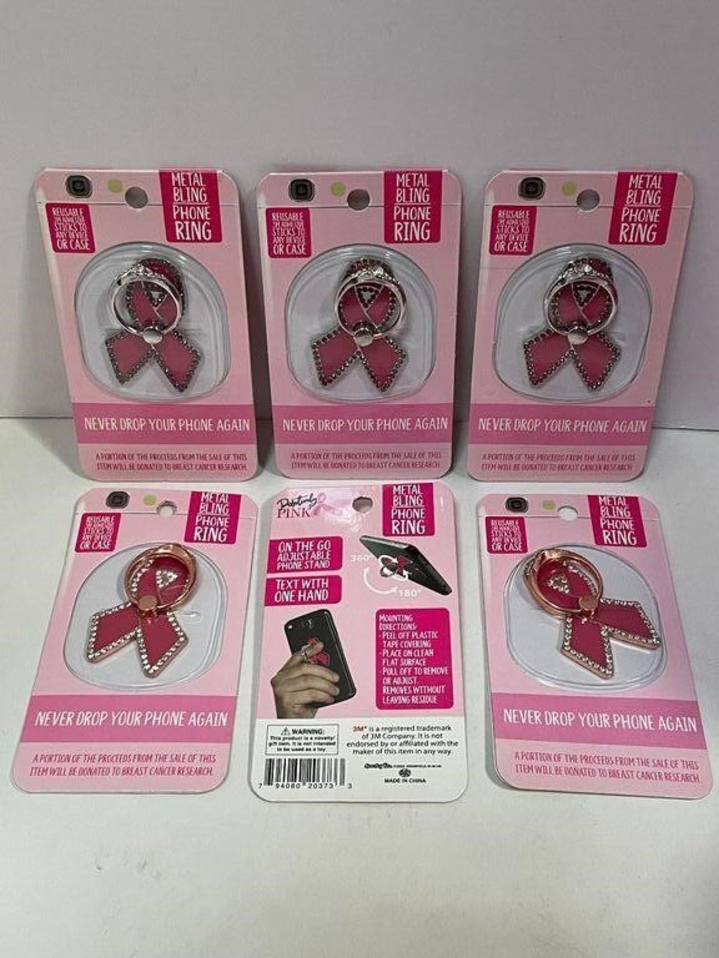 6 X BREAST CANCER PINK CELLPHONE STAND RING HOLDERS, ATTACH TO THE BACK OF YOUR PHONE TO STAND UP