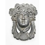 Knocker with head of Dionysus (?). 18.6 x 14.6 x 4.8 cm