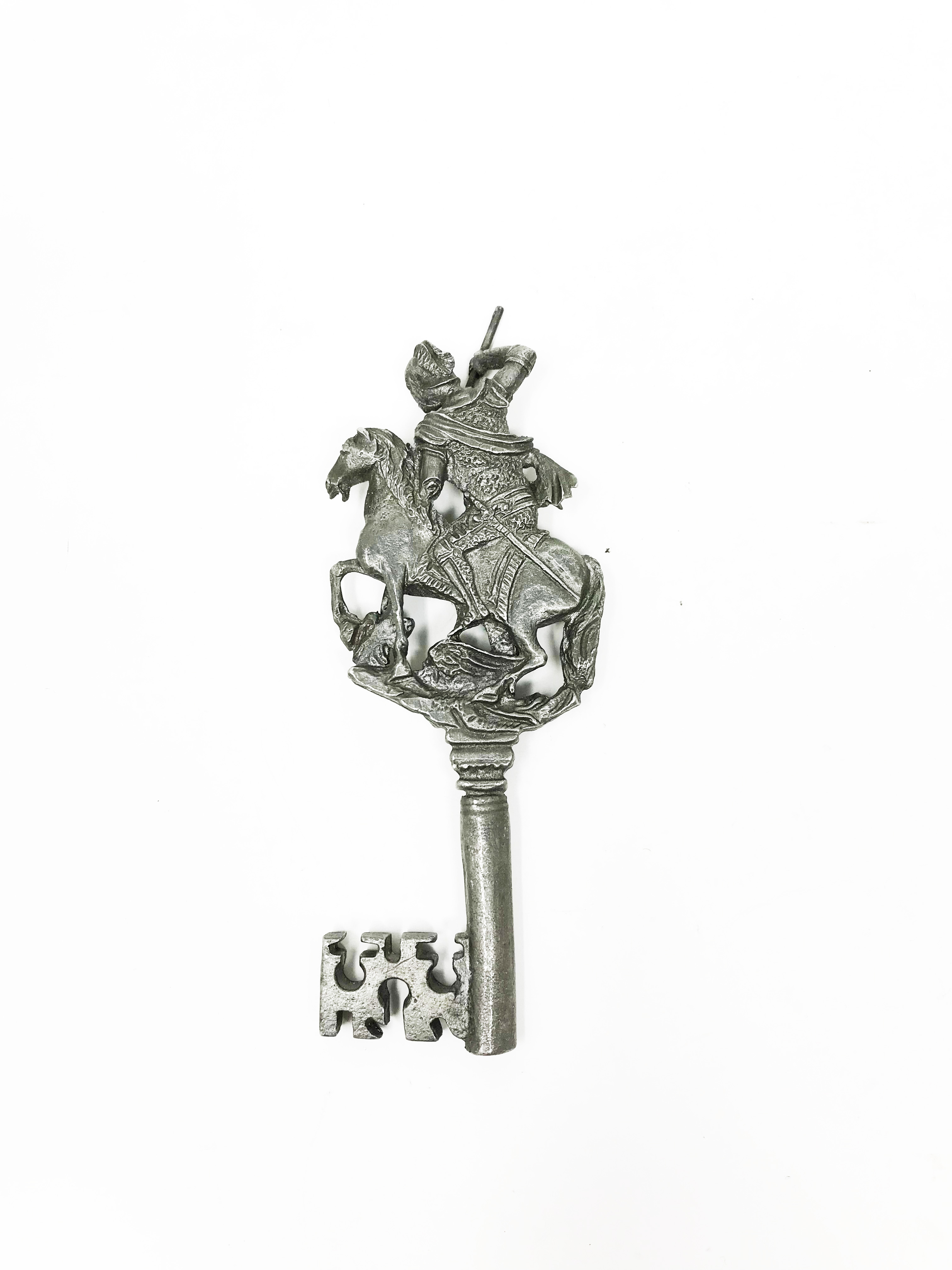 Cast metal gothic style key, decorated with Saint Michael slaying the dragon.14, 83 cm. Part of - Bild 2 aus 2