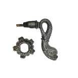 Iron door knocker with dolphin on leafy rose. 18.6 cm. Part of the chapter "From the Time of the