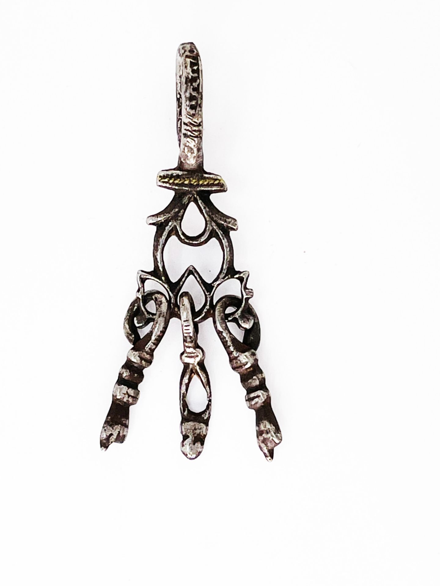 Hermaphroditic amulet, known as a "devil hunter" for the protection of the couple. Wrought iron,