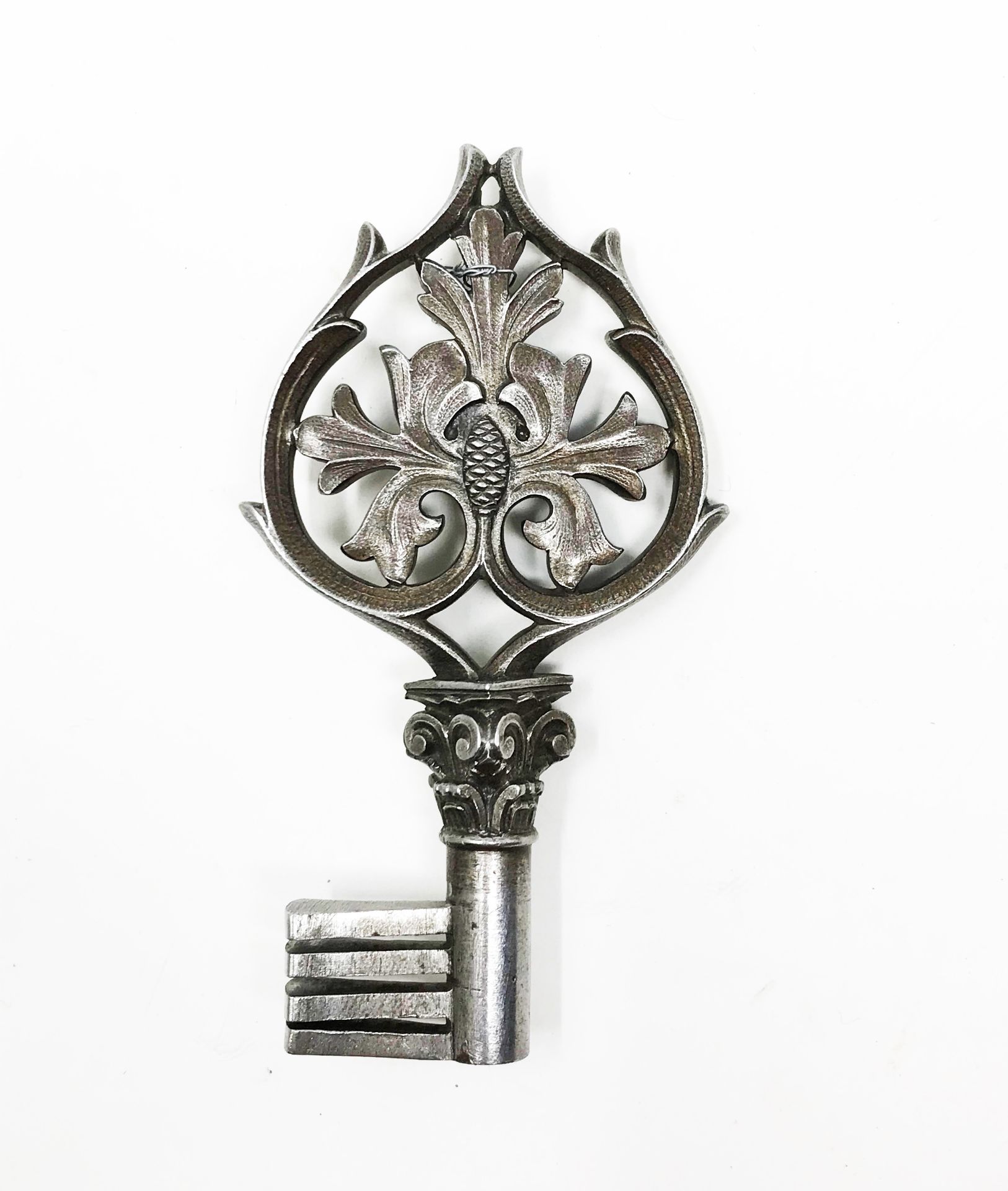 Wrought and chased iron key, cordial ring pierced with foliage and a thistle bud on a Corinthian - Image 2 of 2
