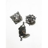 Three wrought iron pull handles on plate18.4 - 21.9 - 16.8 cm. Part of the chapter "From the Time of
