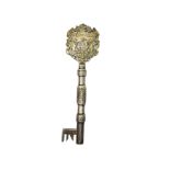 Ceremonial key in silver, partially gilt, the ring engraved with "Presented by the town council of