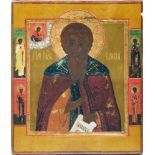 Russian icon "Saint Paisiy" with selected saints on borders. - Russia, 19th cent. - 31x26cm.