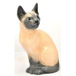 Porcelain figurine "Sitting cat". - Denmark, Royal Copenhagen, 20th cent. - 10x7x20 cm.