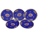 Five plates with flower bunches. - Europe?, 19th cent. - Diameter: 25 cm.