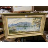 A FRAMED OIL PAINTING OF A LAKE SCENE, SIGNED J.ROBERTS