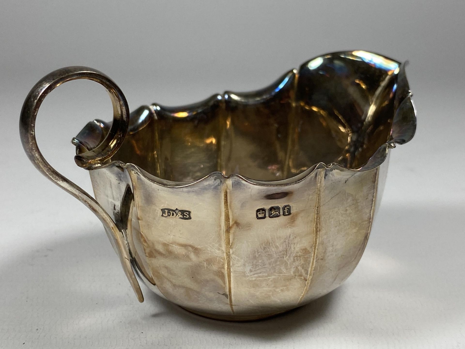 A GEORGE V SILVER FLUTED CREAM JUG, HALLMARKS FOR SHEFFIELD, 1923, MAKERS JAMES DIXON & SONS - Image 3 of 3