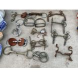 AN ASSORTMENT OF VINTAGE HORSE TACK TO INCLUDE STIRRUPS AND BITS ETC