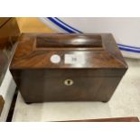 A 19TH CENTURY MAHOGANY TEA CADDY WITH TWO INNER LIDDED SECTIONS
