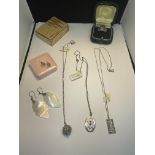 SIX SILVER ITEMS TO INCLUDE THREE PENDANTS ON CHAINS, A RING WITH BLUE STONE AND TWO PAIRS OF