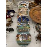 A COLLECTION OF SEVEN POOLE POTTERY CABINET PLATES DIAMETER 15CM