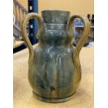 A CHRISTOPHER DRESSER STLYE ART NOUVEAU POTTERY TRI HANDLED VASE