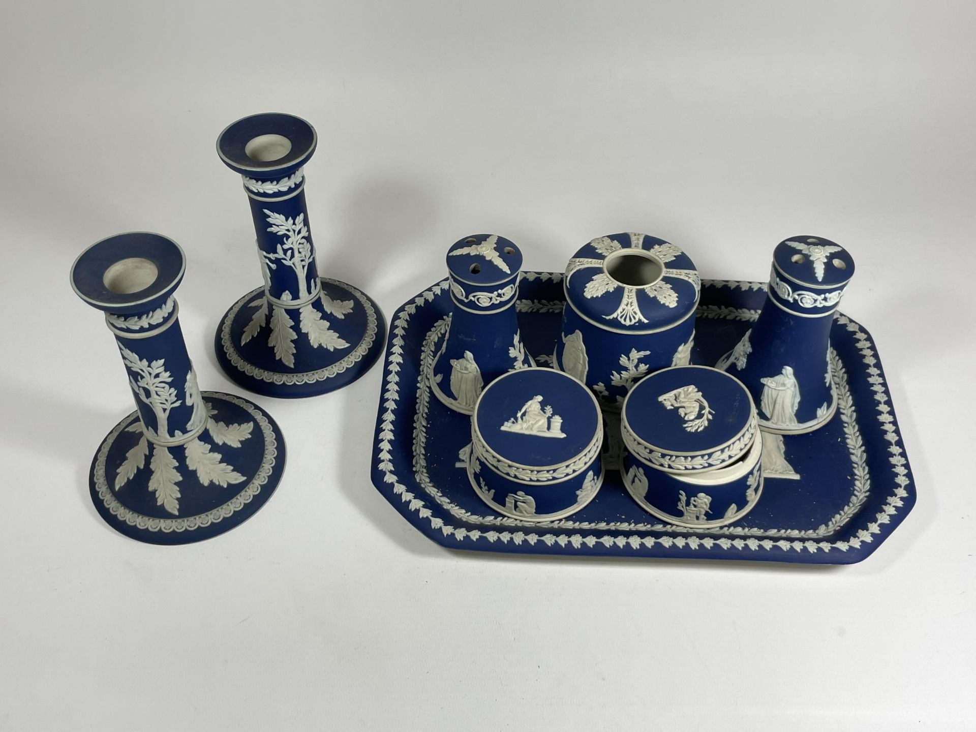 AN ADAMS JASPERWARE POTTERY DRESSING TABLE SET WITH A PAIR OF CANDLESTICKS