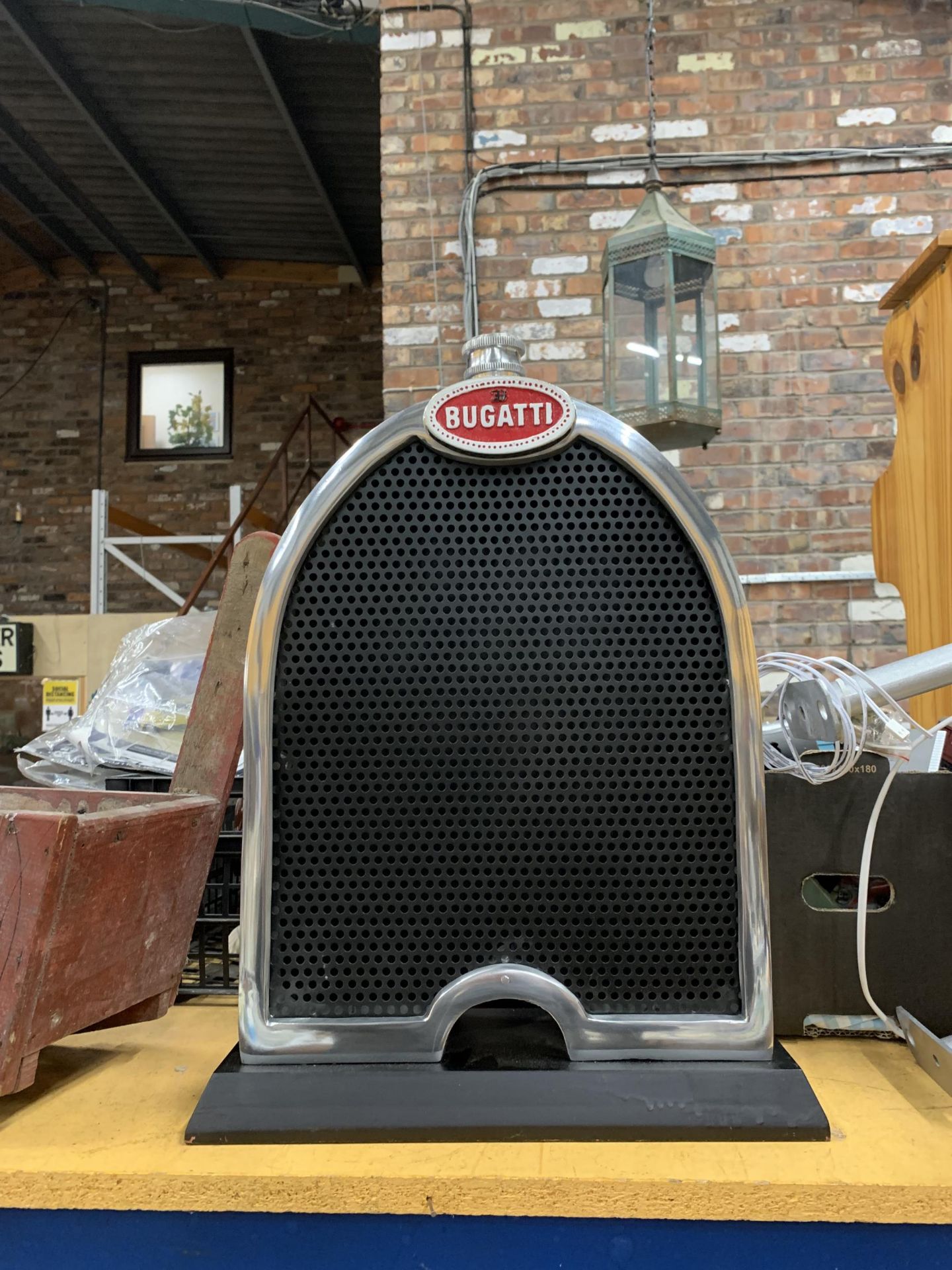 A CHROME BUGATTI STYLE RADIATOR ON A BASE HEIGHT 49CM