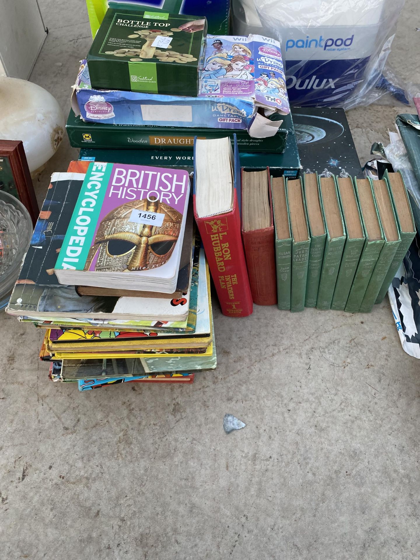 AN ASSORTMENT OF BOOKS AND GAMES