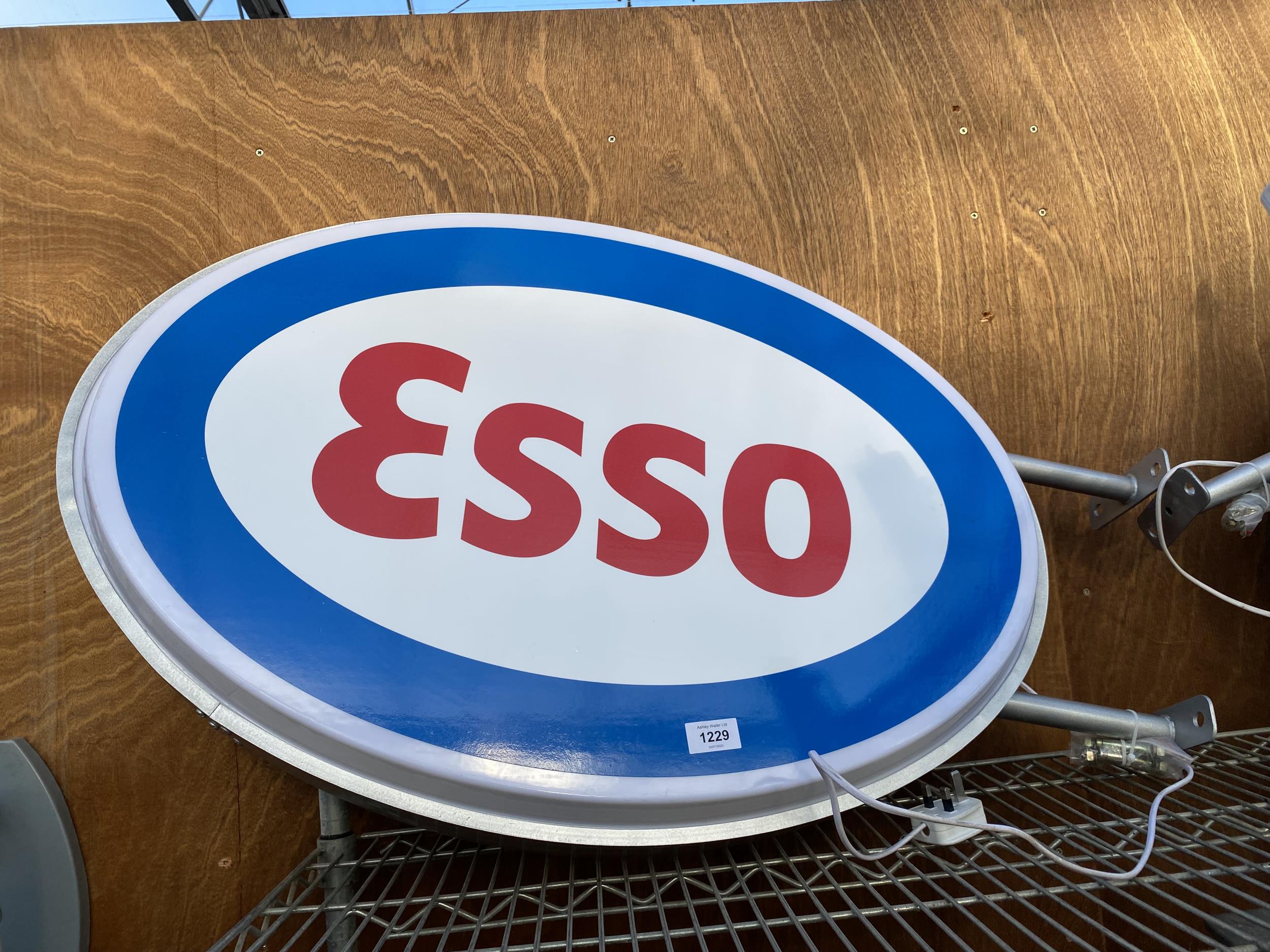 AN ILLUMINATED DOUBLE SIDED ESSO WALL HANGING SIGN