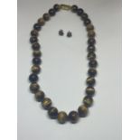 A TIGERS EYE NECKLACE AND A PAIR OF EARRINGS