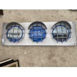 A FORD RS2000 ILLUMINATED LIGHT BOX SIGN WITH THREE IMAGES IN SEPERATE HEADLIGHT DESIGN- WORKING