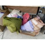 A LARGE ASSORTMENT OF CUSHIONS AND BLANKETS
