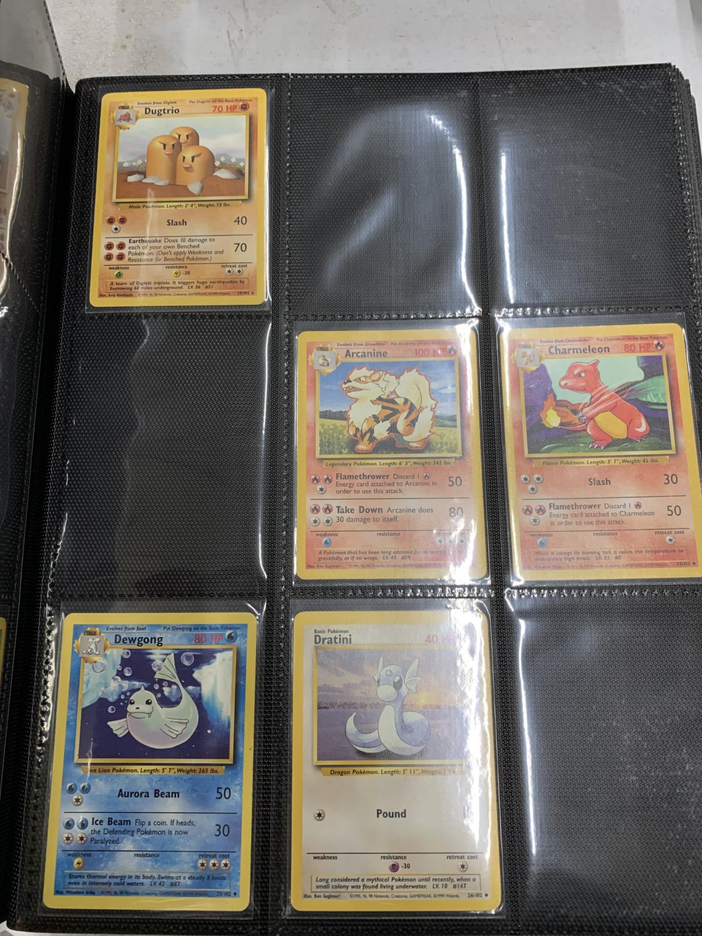 A FOLDER OF POKEMON CARDS TO INCLUDE 1999 BASE SET, TOPPS SERIES 1 INCLUDING CHARIZARD AND HOLOS - Image 2 of 5