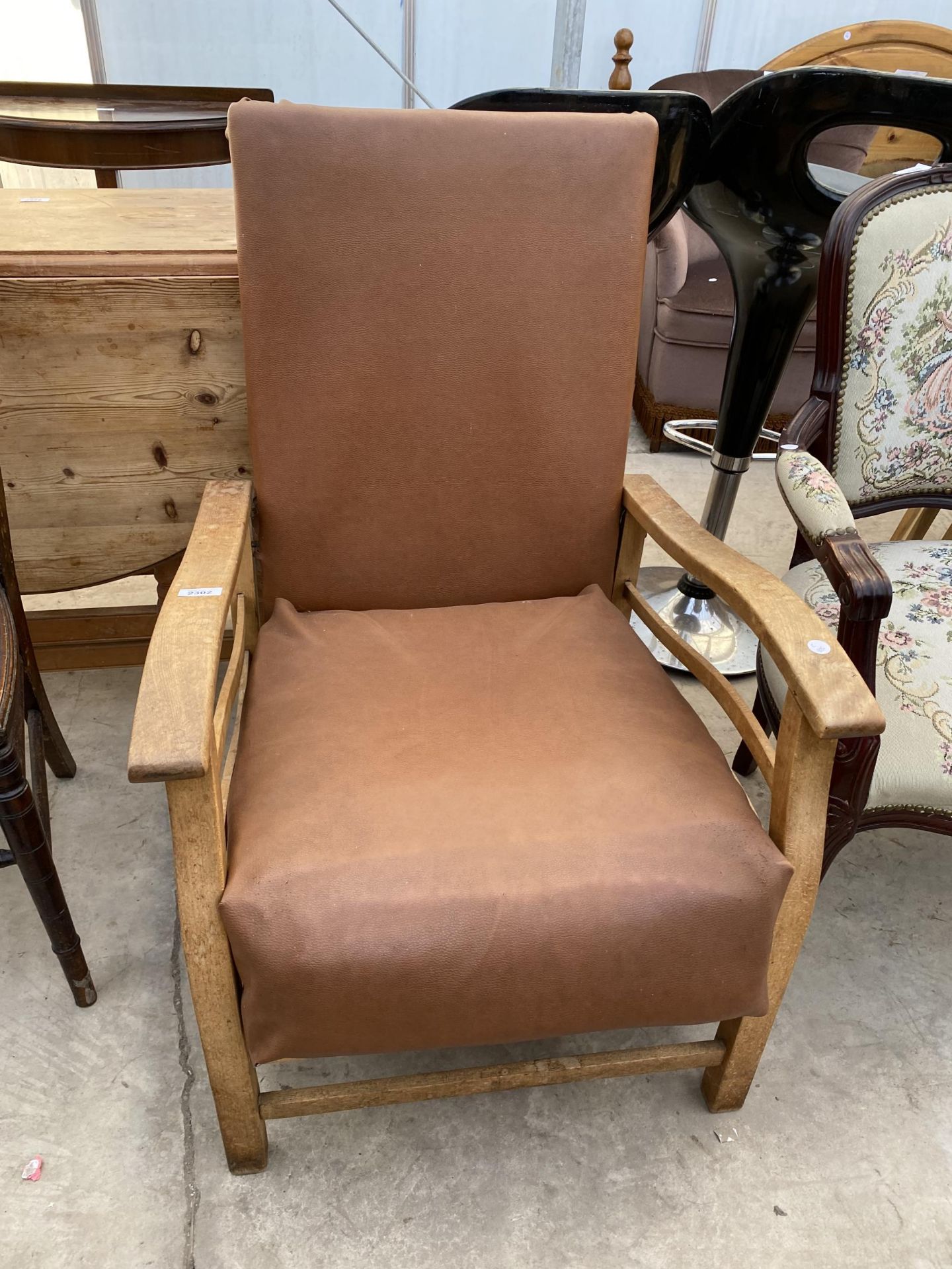 A 1950'S BEECH RECLINING CHAIR