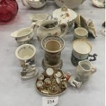 A QUANTITY OF CERAMICS TO INCLUDE JUGS, VASES, A MINIATURE TEASET, ETC