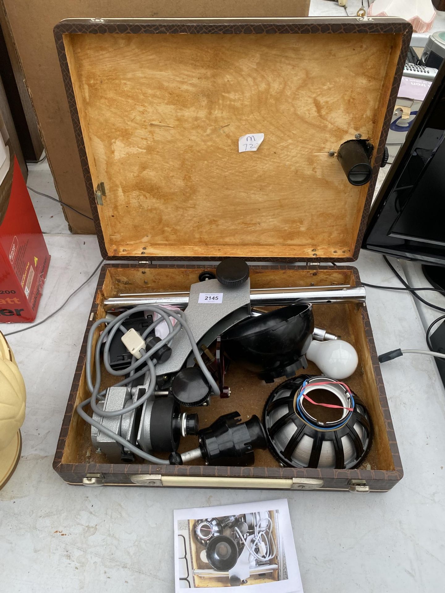 A MICROSCOPE AND ATTATCHMENTS WITH A CARRY CASE