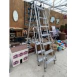 A SIX RUNG ALUMINIUM STEP LADDER AND A FURTHER TWO RUNG STEP LADDER