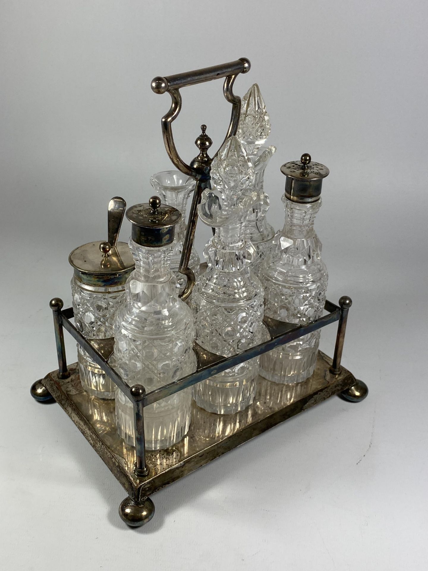 A SILVER PLATED CONDIMENT SET WITH CUT GLASS BOTTLES - Image 2 of 2