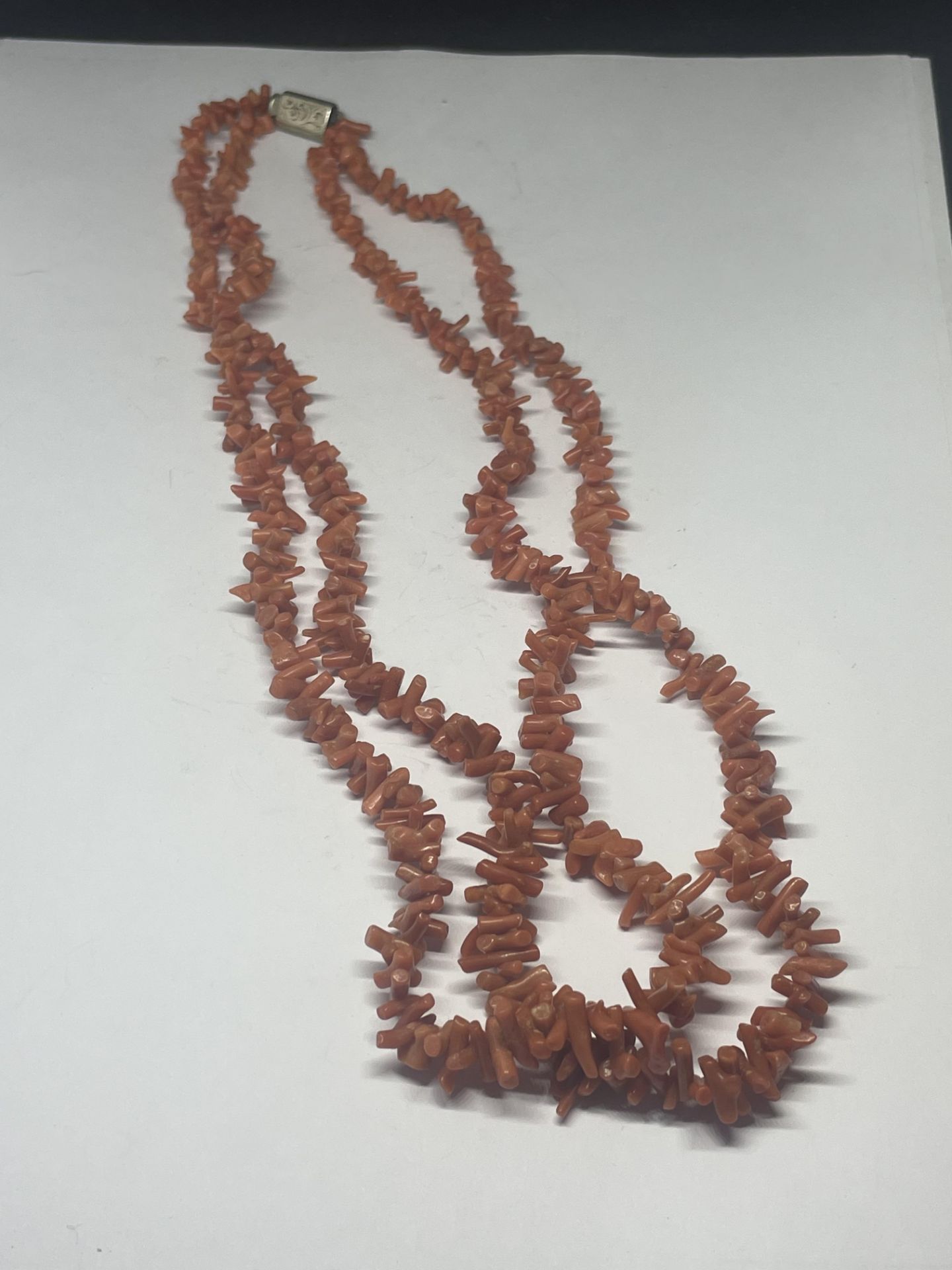 A DOUBLE STRAND CORAL NECKLACE