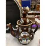 A LARGE TREACLE GLAZED BARGEWARE TEAPOT - A/F HEIGHT APPROX 33CM