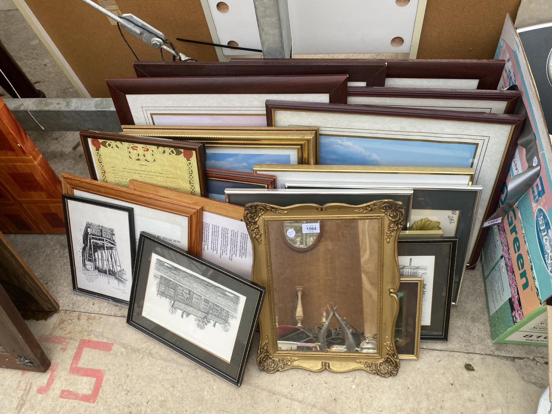 A LARGE ASSORTMENT OF FRAMED PRINTS AND PICTURES