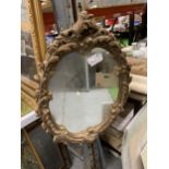 A VINTAGE STYLE OVAL MIRROR WITH A GILT FRAME HEIGHT 63CM, WIDTH 46CM