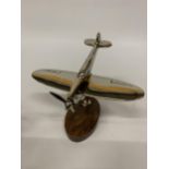 A CHROME SPITFIRE ON A WOODEN BASE HEIGHT 20CM