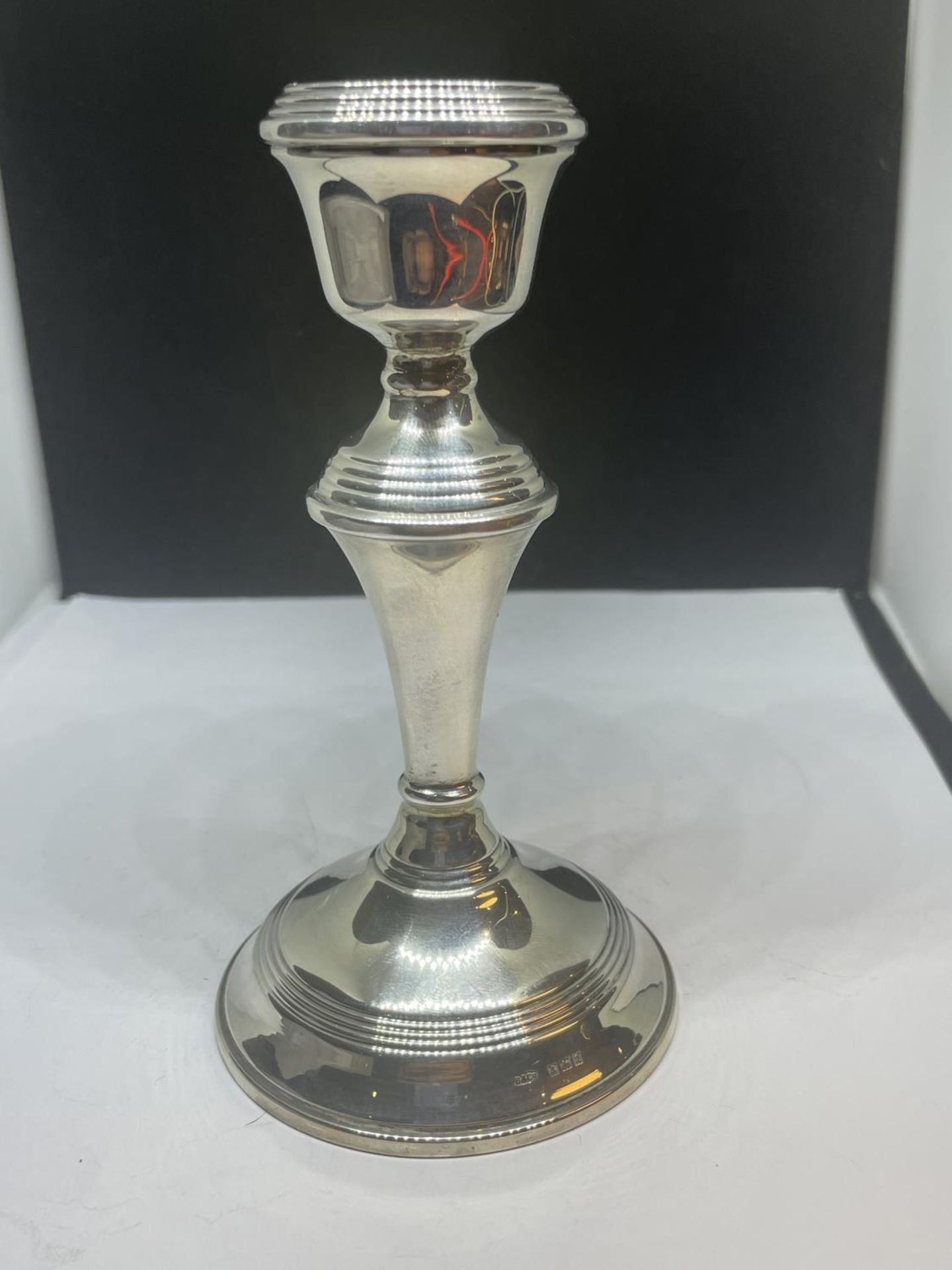 A HALLMARKED BIRMINGHAM SILVER CANDLESTICK GROSS WEIGHT 207.7 GRAMS WITH WEIGHTED BASE