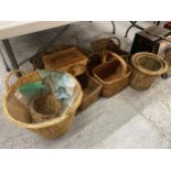 A LARGE QUANTITY OF BASKETS TO INCLUDERA LOG BASKET, SHOPPING, A TRUG, WASTE BINS, ETC