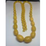 A BUTTERSCOTCH AMBER NECKLACE WITH DISCREET SCREW CLASP LENGTH 95CM