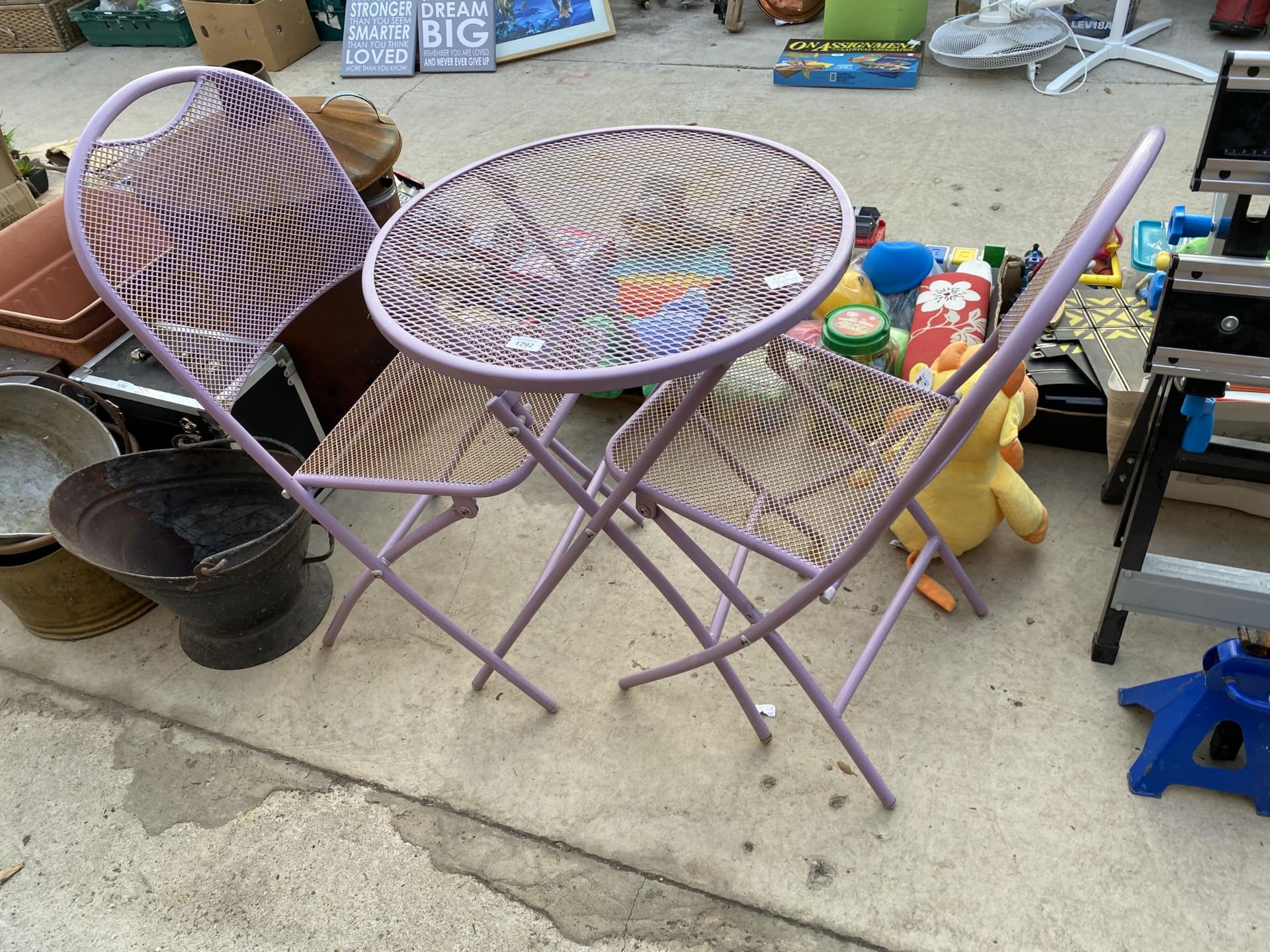 A KETTLER METAL BISTRO SET COMPRISING OF A ROUND TABLE AND TWO FOLDING CHAIRS